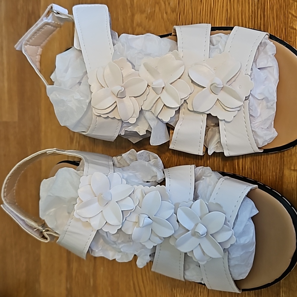 Womens Size 42 white wedge sandals.